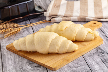Raw uncooked croissant for bake