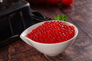 Salmon red caviar in the bowl