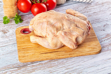 Raw whole uncooked organic chicken