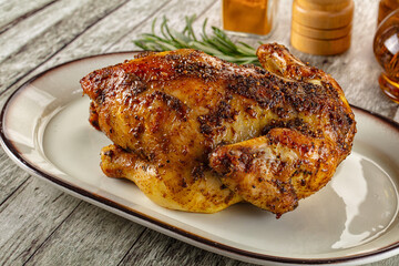 Baked in oven whole chicken with spices