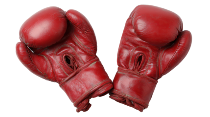 Vibrant red boxing gloves displayed on pristine white backdrop, capturing the spirit of the sport and the energy of competition