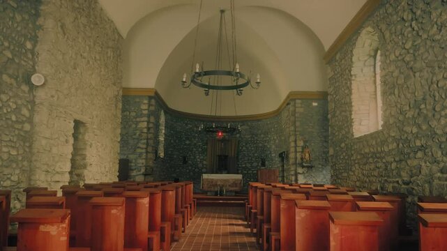 POV shot of the interior of an old church in Saint-Martin-d'Uriage, French Alps