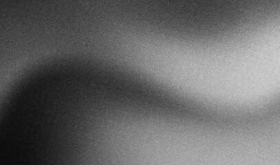 Grainy gradient subtly transitioning from light to dark, creating an abstract background with a...
