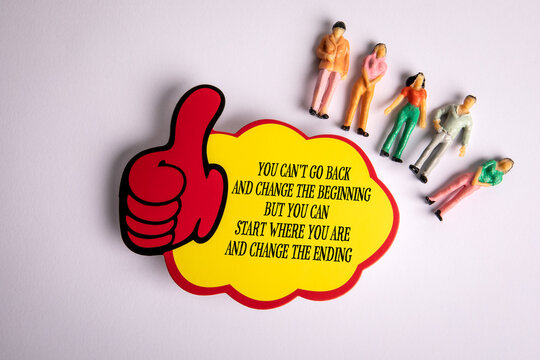 Motivational Message with Thumbs Up Icon and Miniature People on White Background
