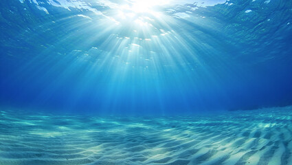 Obraz premium Underwater Serenity: Sunbeams Dancing Through Azure Waters, Illuminating Sandy Seabed Patterns in Tranquil Ocean Depths, a Mesmerizing Aquatic Vista of Light and Shadow