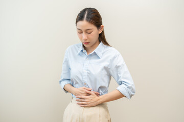 Flatulence asian young woman intolerance hand in stomach ache, suffer from food poisoning,...