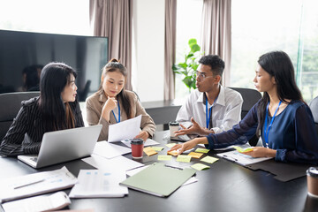Business asian Multicultural businesspeople working project  working together in office conference ideas in startup at office Diversity leadership and business people