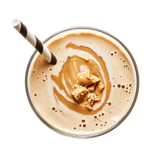 Aerial view of a creamy tan colored smoothie in a glass with a straw and cookie pieces on top swirl design on transparent background