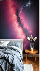 A relaxing bedroom scene featuring a bed with soft light gray bedspreads and matching pillows, placed against a vibrant galaxy-themed feature wall. The wall depicts a picturesque 