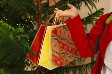 Woman hand pick up of the colorfull of shopping bag at the store retail