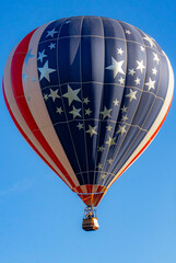 Colorful Hot Air Balloon Soars Above Centralia, Illinois at Sunrise

