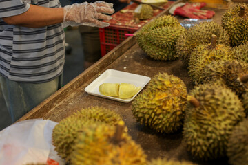 Plenty of Monthong durians at Chiang Mai Market, Thailand. Thai fruits from orchard owners are sold...