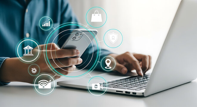 Man using smartphone and laptop connecting to online banking and e-commerce platforms