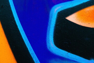 Abstract graffiti art featuring bold blue, orange, black curves. Urban 90s style, vibrant, funky...