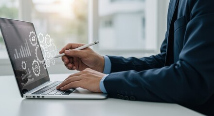 Business Professional Analyzing Data Visualization on Laptop Screen with Stylus.