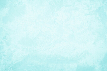 Pastel blue and white concrete stone texture for background in summer wallpaper. Cement and sand wall of tone vintage. Concrete abstract wall of light cyan color, cement texture mint green for design.