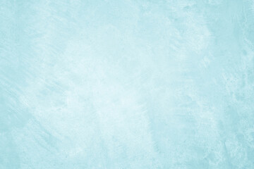 Pastel blue and white concrete stone texture for background in summer wallpaper. Cement and sand wall of tone vintage. Concrete abstract wall of light cyan color, cement texture mint green for design.