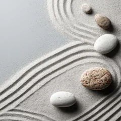 Photo sur Plexiglas Serene sand garden with smoothed stones arranged along gently curving lines