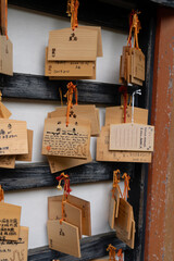 Ema plaques worshipers Japan writen prayers and wishes