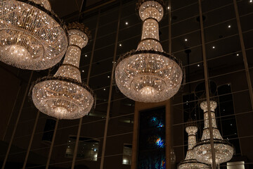 Elegant chandeliers illuminating the hotel lobby