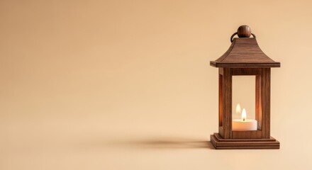 Wooden lantern with a lit candle on a beige background perfect for autumn and winter holiday designs