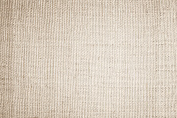 Brown sackcloth woven texture background in natural pattern. Jute hessian burlap, linen background in light beige cream color blank. Weaving canvas fiber line cotton cloth textured as organic.