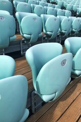Obraz premium Numbered Stadium Seats on Wooden Bleachers