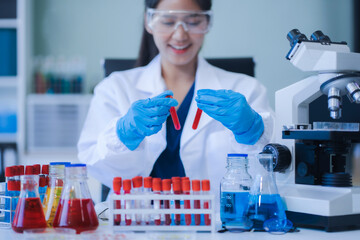scientist researcher conducting an experiment working in the chemical laboratory.
