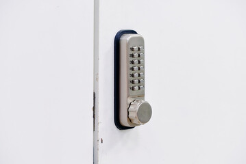 Key code door lock store. door safety system with keypad closeup, secure access technology and...