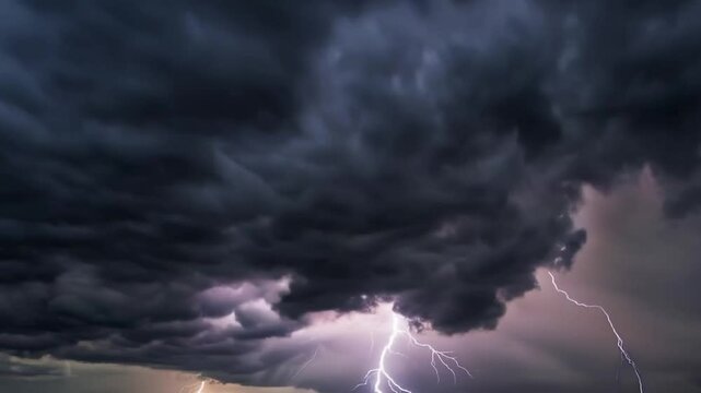 Dramatic 4K time lapse of heavy clouds gathering for a thunderstorm, with lightning bolts striking rapidly and thunder rumbling in the background video Background
