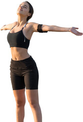 A young slim athletic girl in sportswear performs a set of exercises.