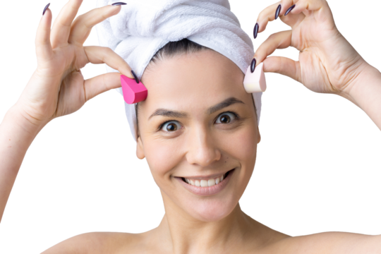 Beauty portrait of woman in white towel on head with a sponge for a body in view of a pink heart. Skincare cleansing eco organic cosmetic spa relax concept.