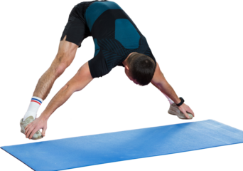 Athletic guy in sportswear and fitness tracker doing exercises in gym.