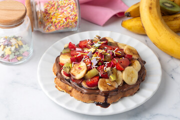 Fruit waffles, chocolate bananas, strawberries, chocolate fries, handmade Turkish waffles and...