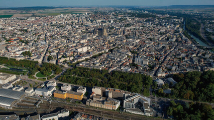 An Aerial panorama view with pan of the old town around the city Reims in France on a sunny spring...