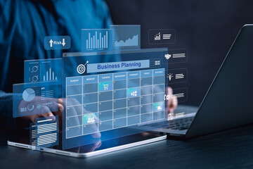Business professional planning organizational strategy using digital tools for scheduling, KPI tracking, and corporate goal alignment.