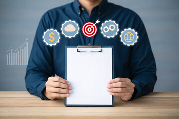 Businessman holding a clipboard with business growth icons and financial symbols isolated on white background