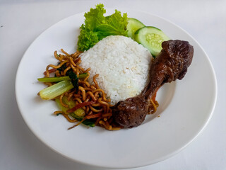 nasi rames well known in indonesia. this food usually be a common lunch in indonesian people. it contains a lot of protein, carbo, and vegetables make it more healthy.