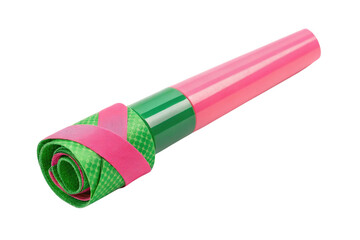 Close up of a pink and green party horn with a rolled up end on a black background studio shot