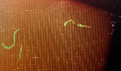 Vintage distressed old photo light leaks, film grain, dust and scratches texture overlay with...
