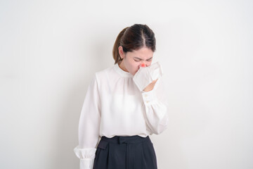 business woman blowing her nose with tissue for concepts of Common Cold, Influenza, Flu, Hay,...