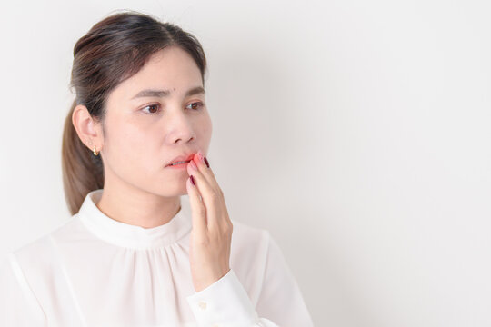 Business woman having Mouth ache for concepts of Mouth Ulcer Sore, Aphthous Stomatitis, Oral Lesions, Halitosis, Oral Health Care, Toothache and Gum Disease, Dental Caries, Gingivitis and  Periodontal
