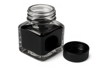 Small opened glass bottle containing black ink, with its black cap next to it, isolated on transparent background