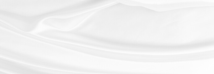 White gray satin texture that is white silver fabric silk background with beautiful soft blur pattern natural.