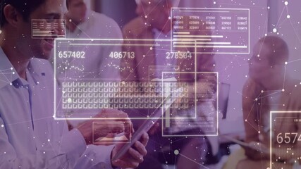 Seated man tapping tablet and animating data panels with updating charts in business meeting - Powered by Adobe