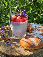 Berry dessert with pastries on wooden table