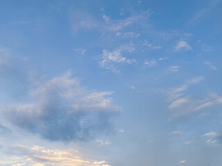 Image of a blue sky and some clouds with copy space for text. Cloudy blue sky abstract background,...