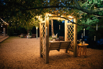 Swing and wedding decor in the evening