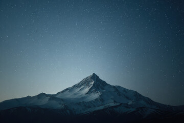 breathtaking view of aconcagua mountain under clear night sky filled with ultrabright stars