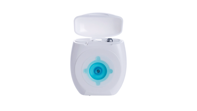 Digital medical thermometer and blue plastic bottle isolated on white